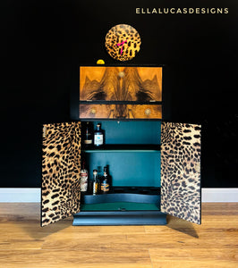 Leopard print cocktail cabinet with clock